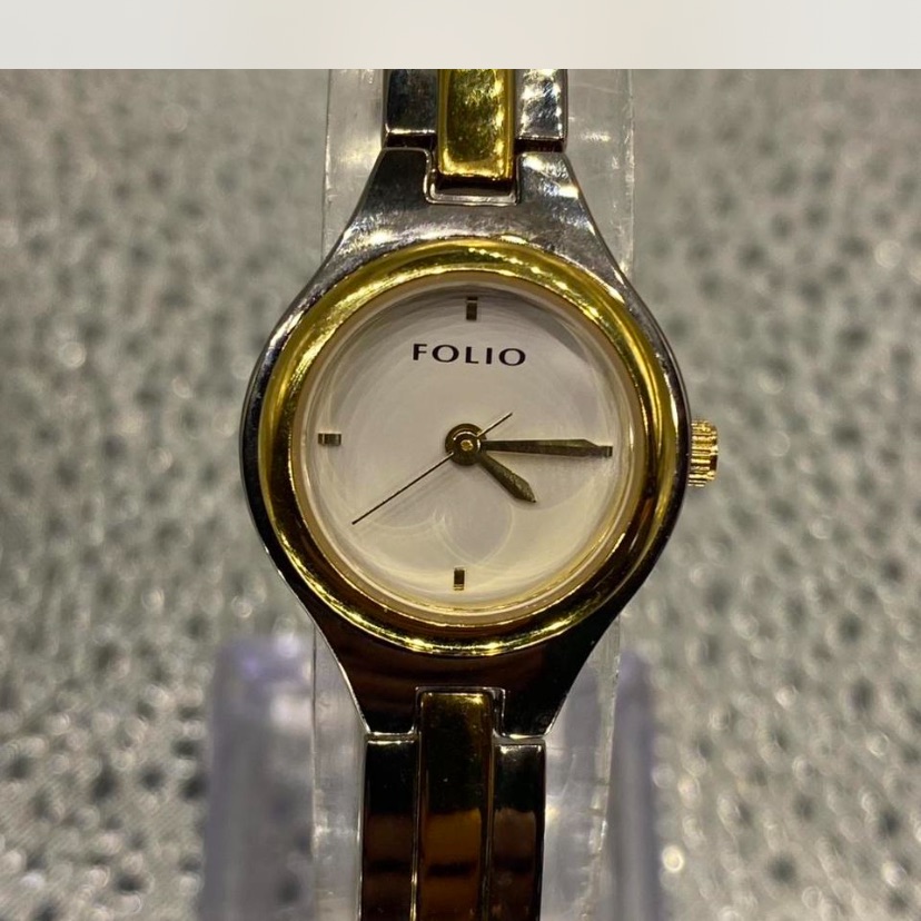Ladies Folio Gold And Silver Watch